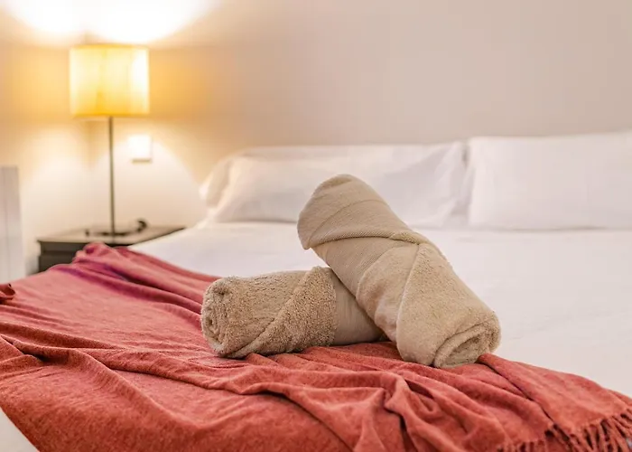 Junto Al Ayuntamiento De *